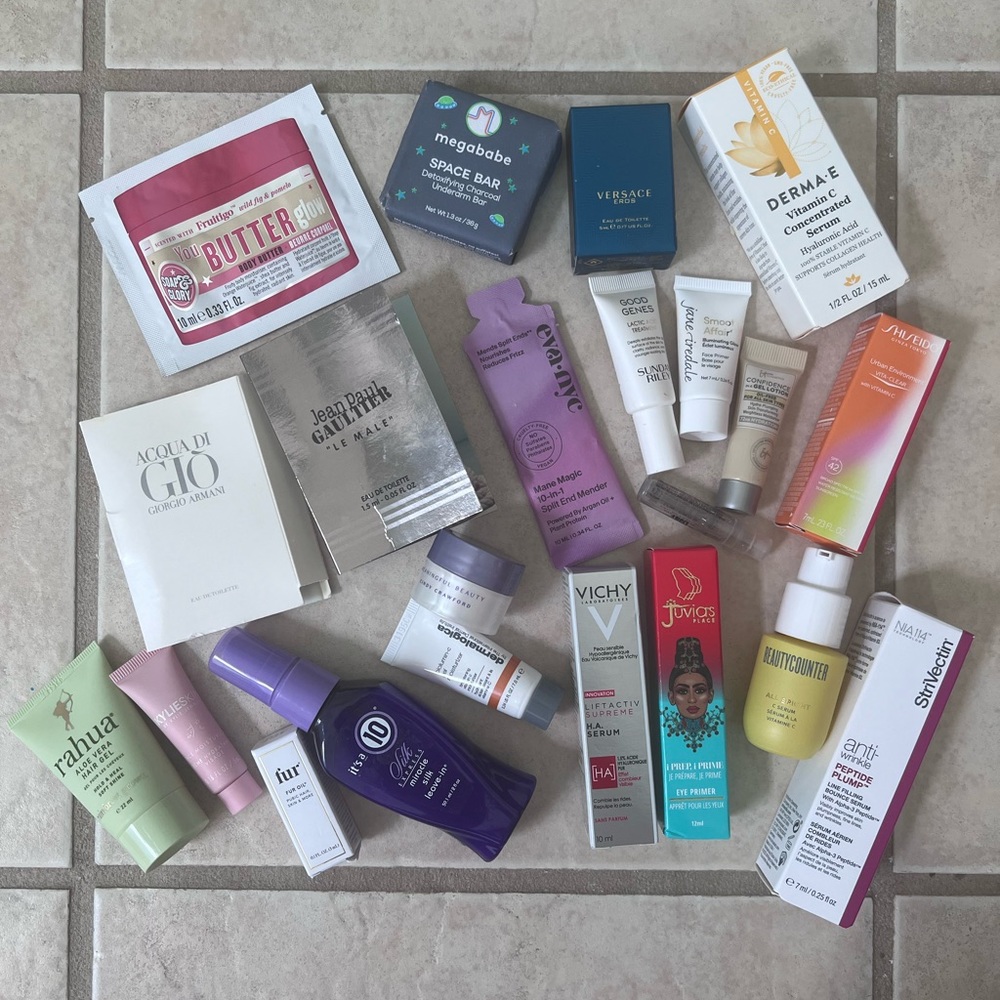 22 assorted beauty samples in a makeup bag